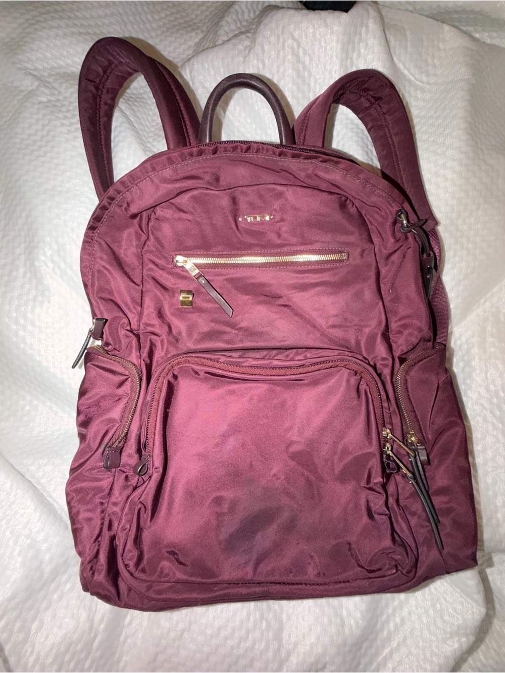 Tumi Burgundy Nylon Backpack with Gold Hardware